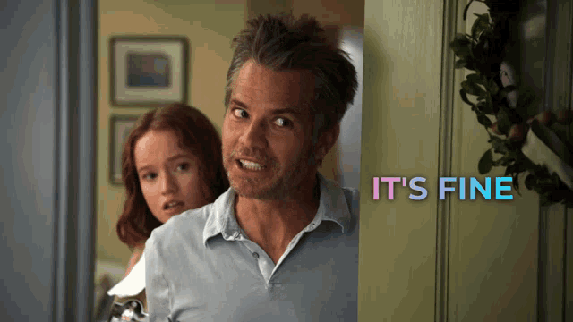 a man and a girl are standing in front of a door with the words it 's fine written above them