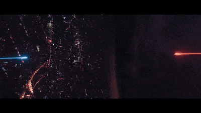 a red and blue light is coming out of a dark space