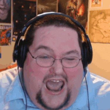 a man with glasses and headphones is making a face