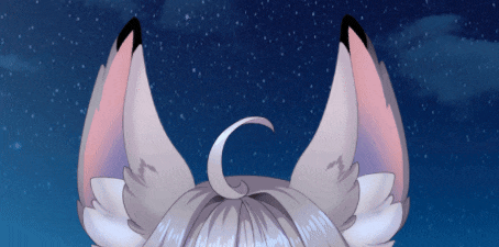 a close up of a fox 's ears against a starry night sky