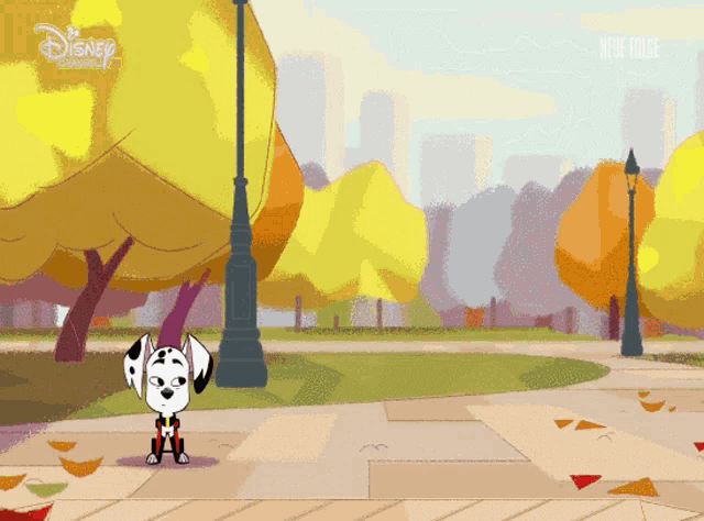 a dalmatian dog is standing on a sidewalk in front of a disney advertisement