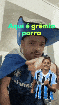 a man wearing a cowboy hat and a gremio jersey points at a woman