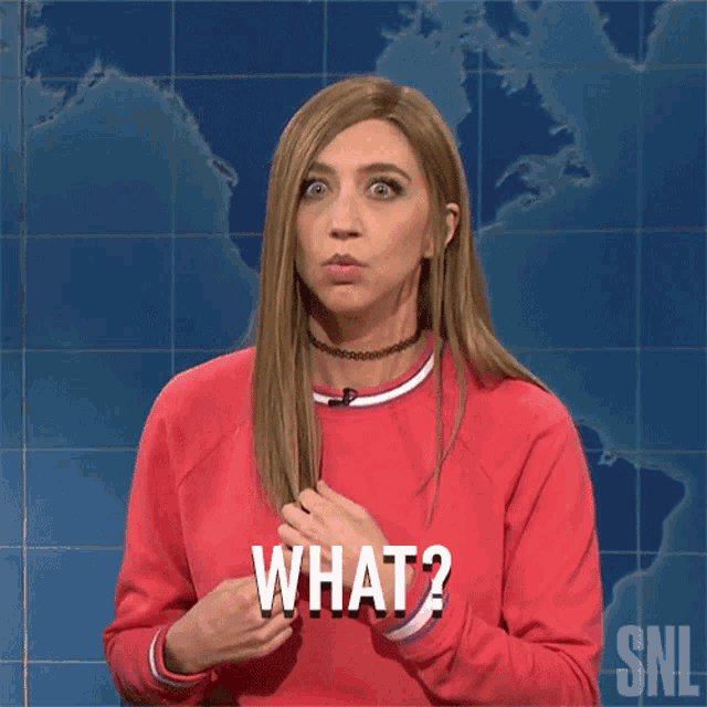 a woman wearing a red sweater says what