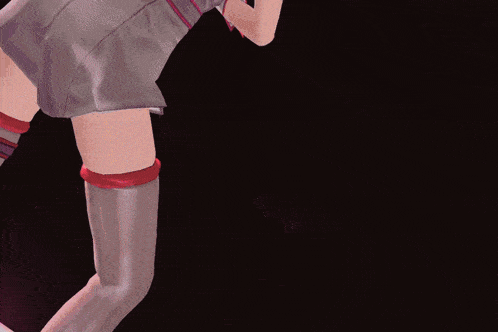 a woman in a gray dress and red knee pads