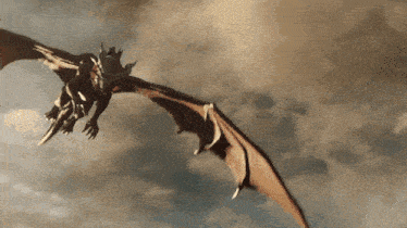 a dragon is flying through a cloudy sky with its wings outstretched