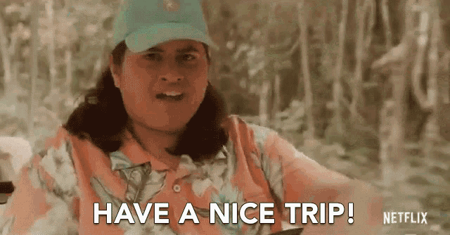a man in a hawaiian shirt and hat is saying have a nice trip !