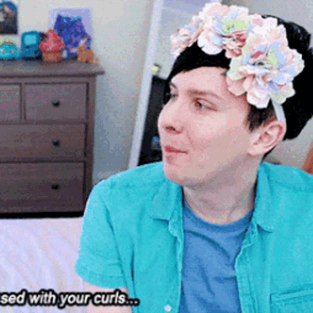 a person with a flower crown on their head and the words " sed with your curls " below them