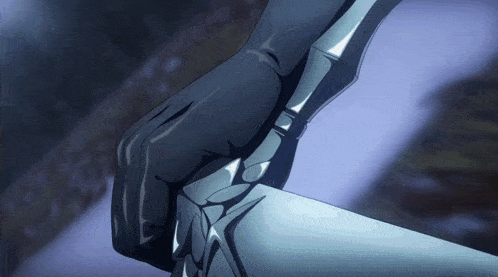 a close up of a person holding a knife in their hand