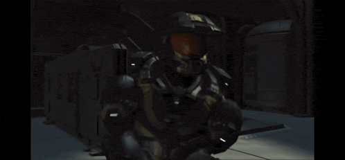 a man in a military uniform is holding a gun
