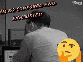 a man is sitting in front of a computer with the words i 'm so confused and exhausted above him .