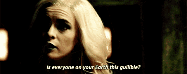 a woman with green lips is asking if everyone on earth is gullible .