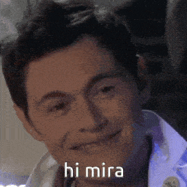 a close up of a man 's face with the words hi mira above him