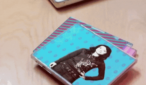 three cds are stacked on top of each other