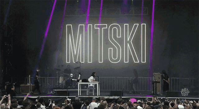 Mitski Performing GIF - Mitski Performing On A Table GIFs