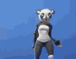 a woman in a panda costume is dancing in front of a blue background .