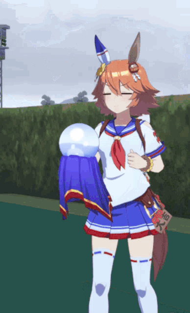 a girl in a sailor outfit is holding a sphere in her hand