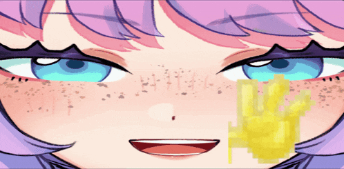 a close up of a girl 's face with a yellow object on her face