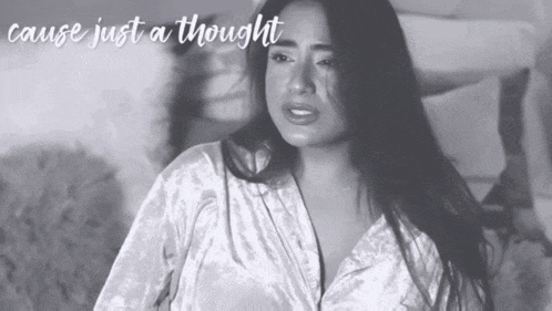 a black and white photo of a woman with the words " cause just a thought " below her