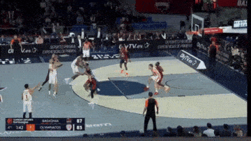 a basketball game between baskonia and olympiacos is going on