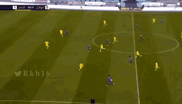 a soccer game is being played on a field with the number 1 on the score board