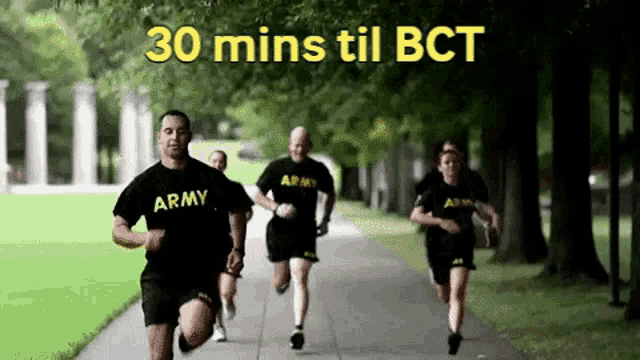 a group of army soldiers are running down a sidewalk in a park