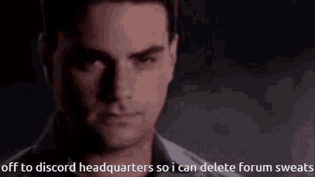a close up of a man 's face with the words off to discord headquarters so i can delete forum sweats below him