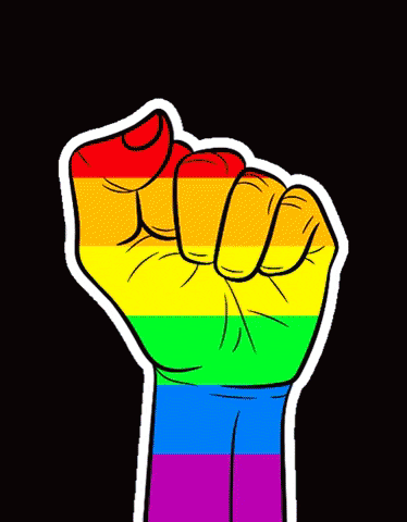 a fist with a rainbow flag painted on it on a black background .