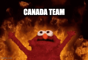 elmo is standing in front of a fire with the words canada team written above him