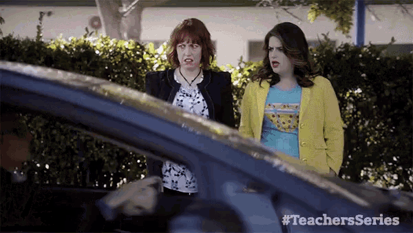 two women standing next to each other in front of a car with #teachersseries on the bottom