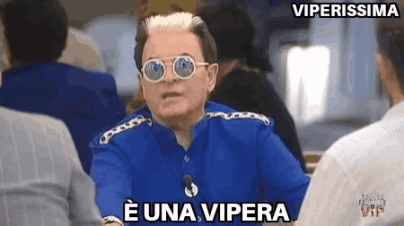 a man wearing sunglasses says e una vipera