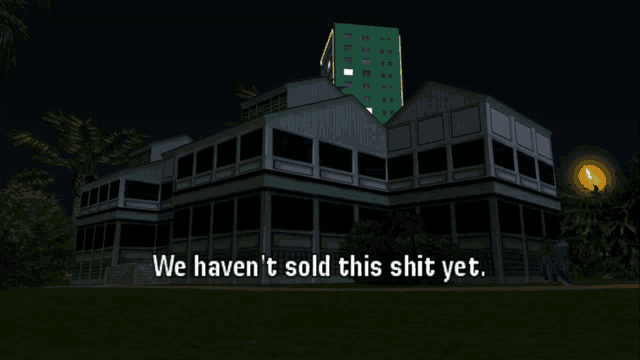 a large building with the words " we haven 't sold this shit yet " below it