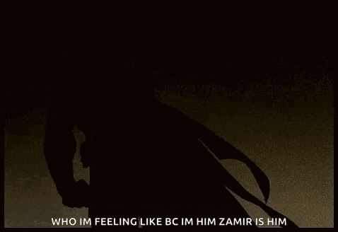 a silhouette of batman standing in front of a lightning storm .
