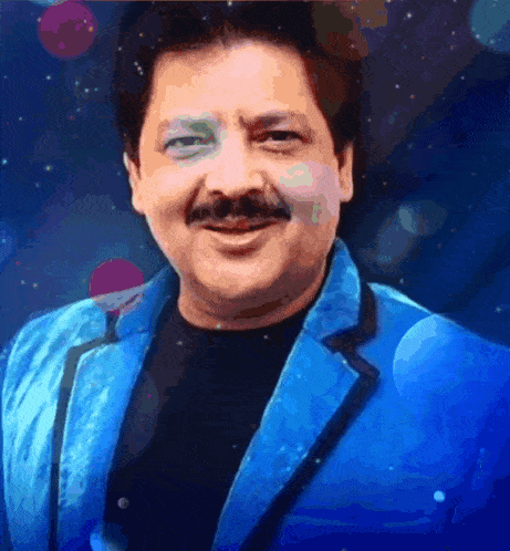 a man with a mustache is wearing a blue jacket and black shirt