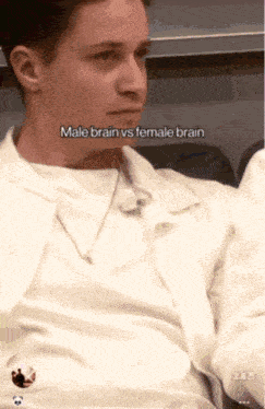 a man with the words male brain vs female brain on his shirt