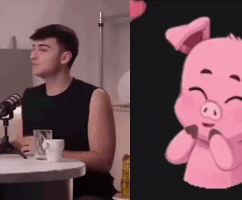 a man is sitting at a table next to a microphone and a cartoon pig is sitting next to him .