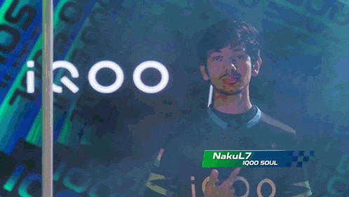 a man wearing a shirt with the name nak on it