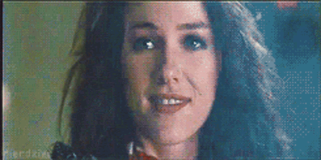 a close up of a woman 's face with a pixelated background that says ' jordan '