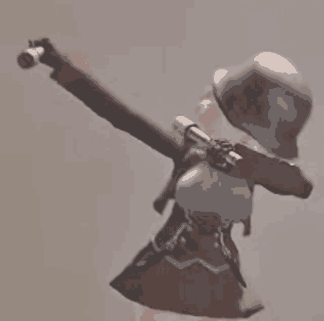 a woman in a helmet is holding a gun in her right hand .