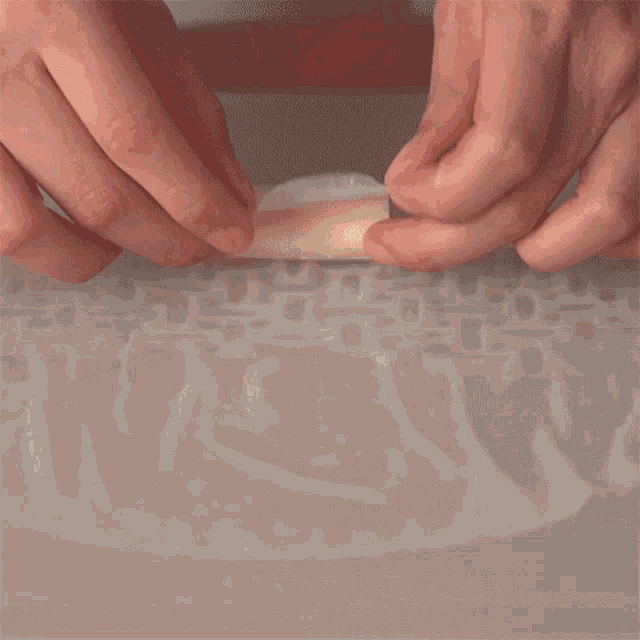 Wrapping A Mozzarella Stick Two Plaid Aprons GIF - Wrapping A Mozzarella Stick Two Plaid Aprons Preparing Food GIFs