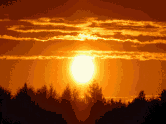the sun shines brightly through the clouds in the sky