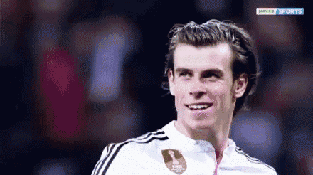 a soccer player is smiling in front of a hopper sports logo