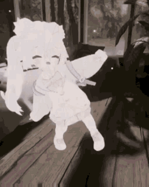 a white anime girl with wings is dancing on a wooden table .