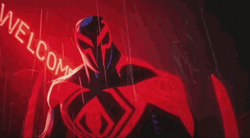 a spiderman in a red suit is standing in front of a welcome sign .