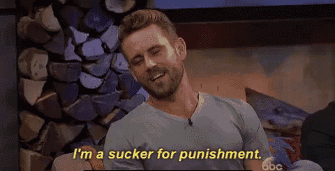a man is sitting on a couch with his eyes closed and saying `` i 'm a sucker for punishment ''