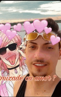 a man wearing sunglasses is taking a picture with a girl with pink hair .