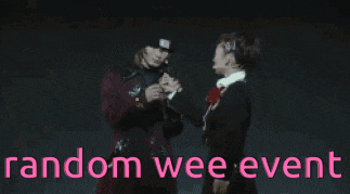 a man and a woman are standing next to each other with the words random wee event in pink