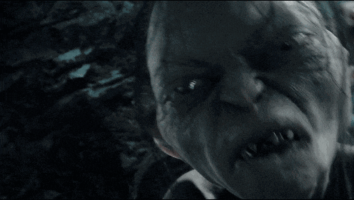 a close up of a person 's face with a scary look on it