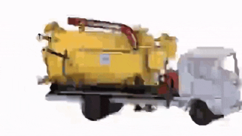 a yellow and white vacuum truck with a red hose attached to the back .
