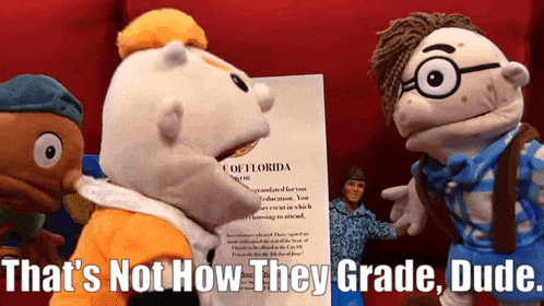 three stuffed animals are standing in front of a sign that says " that 's not how they grade "