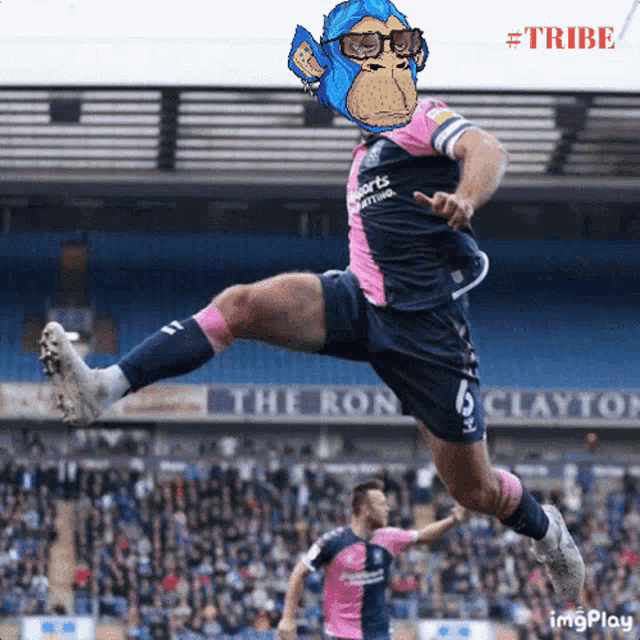 a soccer player wearing a pink and blue jersey with the number 6 on it is jumping in the air